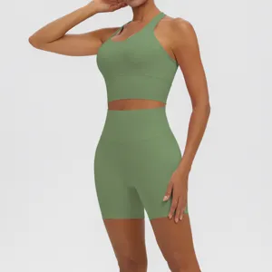 Green yoga wear detail showing the breathable fabric, fitted cut, and comfortable fitness design.
