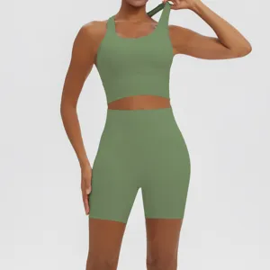 Close-up detail of the green sports yoga set showing breathable fabric and stretchy fit.