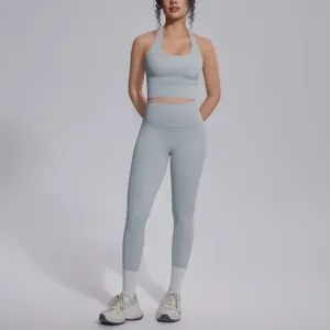 Effen dubbelzijdig nylon sportkleding set, halter sportbeha en hoge taille yoga leggings voor fitness.