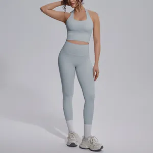 Effen dubbelzijdige nylon yogaset, fitness sportkleding, rugvrije crop top en sportlegging voor dames.