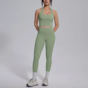 Moderne stijlvolle effen halter crop top en hoge taille yoga leggings sport fitness set