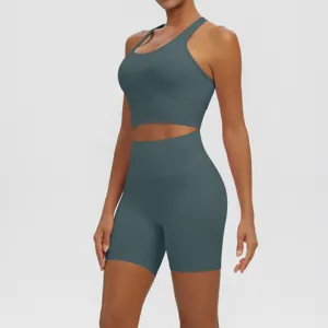 Detail shot of the breathable activewear crop top and high waist shorts for workout fitness.