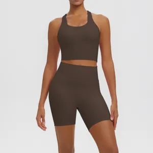 Solid color double-sided nylon breathable yoga set, racerback sports bra and high-waist shorts.