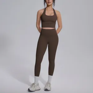 Effen kleur rugloze yogaset, elastische sport-bh en hoge taille fitnessleggings.