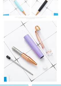 Creative DIY metal ballpoint pen components set with transparent barrel and spare refills.