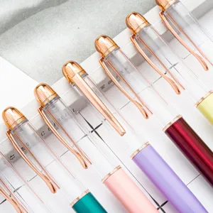 Colorful transparent barrel ballpoint pens with elegant rose gold clips for office and school.