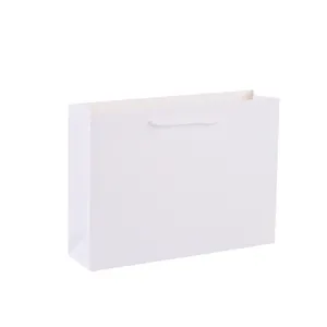 White paper gift bag with rope handles, premium horizontal packaging bag for retail and party.