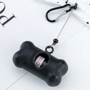 Black bone-shaped dog waste bag dispenser with carabiner clip for outdoor pet walking.
