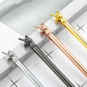 Set of 4 metallic unicorn ballpoint pens in silver, gunmetal, rose gold, and gold colors.