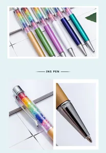 Close up detail view of colorful crystal ballpoint pen with metal rotating barrel and refill.