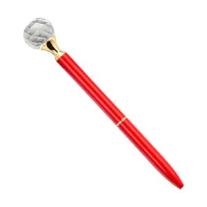 Luxury red metal ballpoint pen with large crystal diamond top, smooth twist writing mechanism.