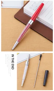 Metal crystal ballpoint pen detail view, sparkling rhinestone glitter refillable office tool.