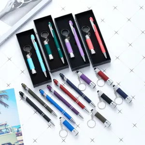 Multi-color ballpoint pen and mini flashlight keychain gift set with capacitive stylus tip.