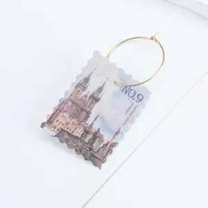 Anneau de breloque pour verre à vin en métal vintage avec pendentif timbre pour les fêtes.
