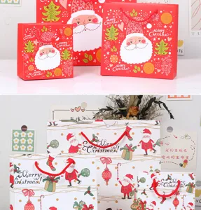 Sacchetti regalo di Natale in carta rossi e bianchi borse festive con disegno Babbo Natale per feste.