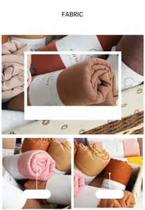 Detailed view of solid color wrinkled cotton linen scarf showcasing soft textured fabric rolls.
