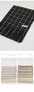 Detailed view of the soft plaid and striped winter scarf with stylish fringes for women.