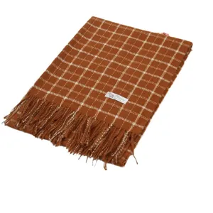 Cozy brown plaid winter scarf with fringe soft woven fabric for women warm and stylish daily wear.