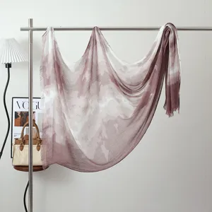 Ink-wash modal women's shawl scarf with stylish tie-dye pattern and frayed hem details.