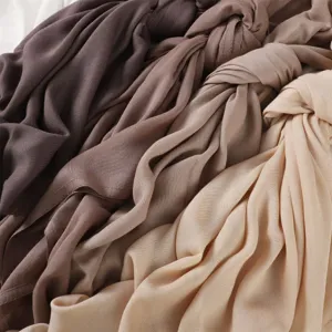 Modal cotton scarf fabric detail view, soft draped solid color shawl material texture.
