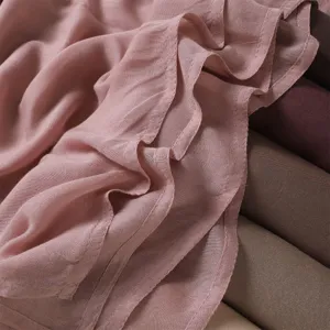 Close up view showing the soft modal rayon fabric texture and delicate double needle hem.