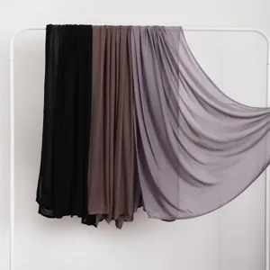Detailed view of modal cotton solid color women scarves hanging on a rack, soft and breathable.