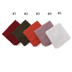 Detailed view of colorful sequin scarves featuring five distinct variant colors and soft texture.
