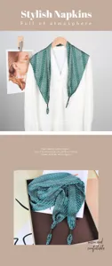 Green patterned triangular scarf detail showing fabric texture and stylish hanging design.