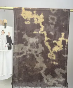 Detailed view of the brown tie-dye modal cotton scarf with watercolor marble print.