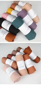 Solid color cotton linen crinkle scarf, soft warm winter fashion neck wrap shawl detail.