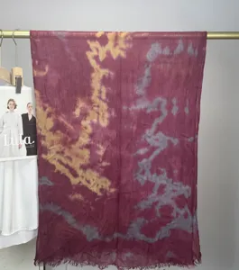 Closeup view of the bohemian modal cotton tie-dye scarf featuring watercolor marble pattern.