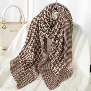 Chic brown houndstooth pleated scarf for women, elegant winter fashion neck wrap accessory.