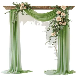 Green wedding arch draping fabric with floral decoration for outdoor ceremony setup.