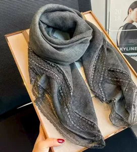 Detailed close-up view of a dark grey Korean-style square scarf featuring delicate lace trim.