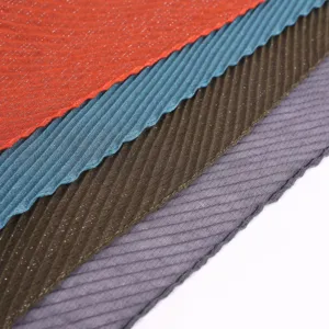 Close up view of women pleated scarf fabric, shimmer twill crinkle headscarf detail.