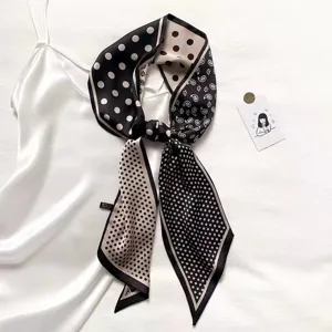 Elegant black and white polka dot narrow silk scarf for women fashion accessory main view.