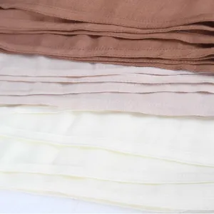 Classic plain rayon scarf close-up showing soft texture and folded layers for daily autumn wear.