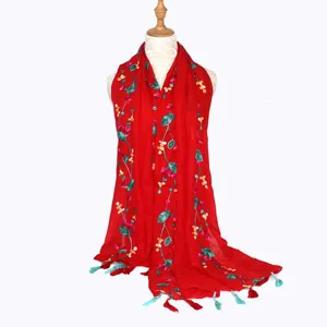 Red embroidered linen scarf shawl with floral pattern and tassels for women daily wear.