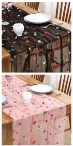 Elegant embroidered mesh table runner with colorful floral pattern for dining table decor.