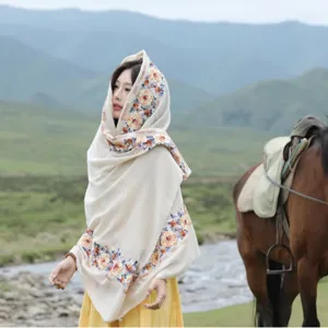 Ethnic embroidered linen shawl cape for women, perfect for travel, photography and daily wear.