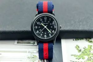 Classic nylon strap military watch with luminous hands and dual time display for students.