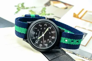 Men military quartz watch with blue green nylon strap and black dial for outdoor sports.