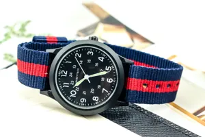 Detailed view of the Korean style men nylon outdoor military watch with black dial and strap.