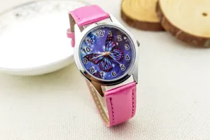 Cute butterfly quartz watch detail, pink leather strap for kids and students daily wear.