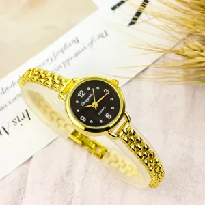 Elegant women small dial quartz watch with gold chain bracelet, minimalist chic design.