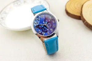 Children quartz watch with blue leather strap and cute butterfly dial for kids daily wear.