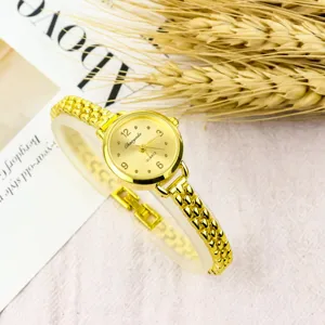 Elegant gold quartz women watch with delicate chain strap and small round dial for daily wear.