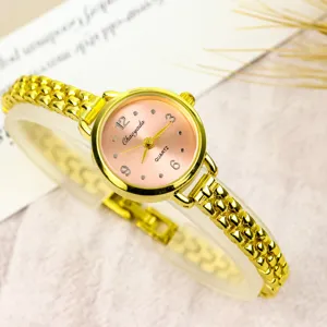 Women quartz watch with gold chain strap and pink dial main view product display