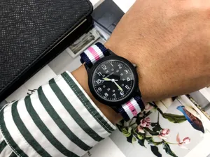 Men's fashion nylon strap quartz watch with stylish striped design for casual daily wear.