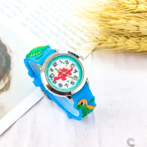 Detailed close-up view of the cute blue cartoon dinosaur kids quartz watch with soft band.